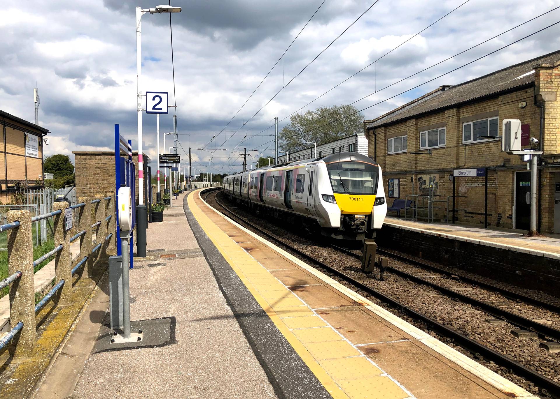 Community Rasil partnership train pulling into station.jpg