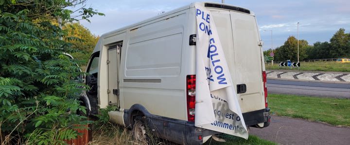 Owner of an abandoned van, spray-painted with offensive wording, is fined £1,884