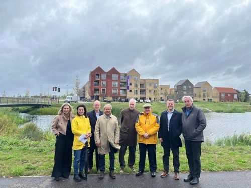 Image of councillors and colleagues at Urban and Civic in front of the new development in Waterbeach